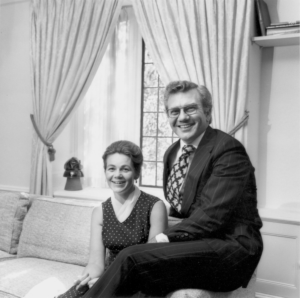 Black and white photo of Ernest L. and Kay Boyer sitting in the living room of the SUNY chancellor’s home in Albany. - BCA