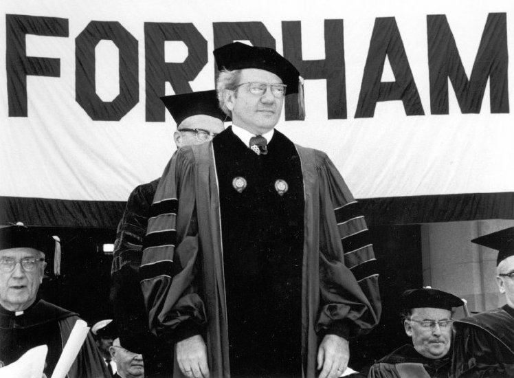 Black and white photograph of Ernest L. Boyer receiving an honorary degree from Fordham University. - BCA