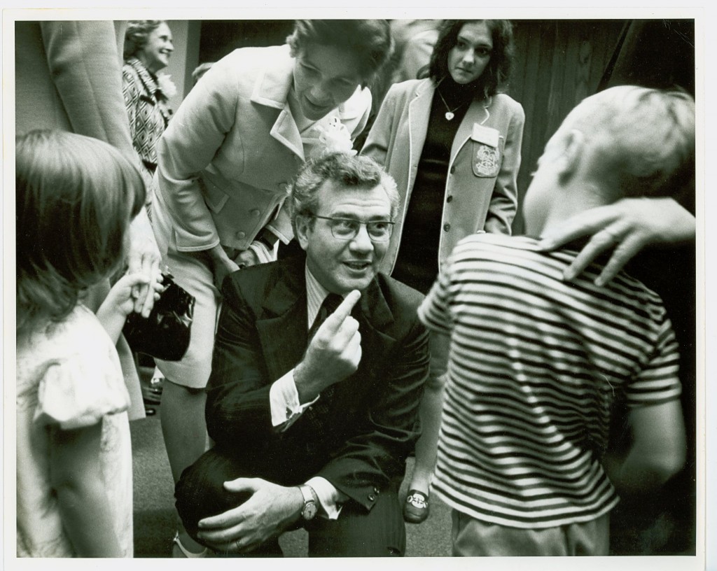 Ernest and Kathryn Boyer speaking to two children while Boyer served as Chancellor of the State University of New York