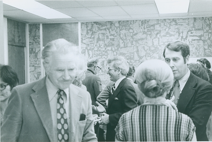 Ernest L. Boyer mingling with employees of the central administration of SUNY in Albany, New York. -BCA
