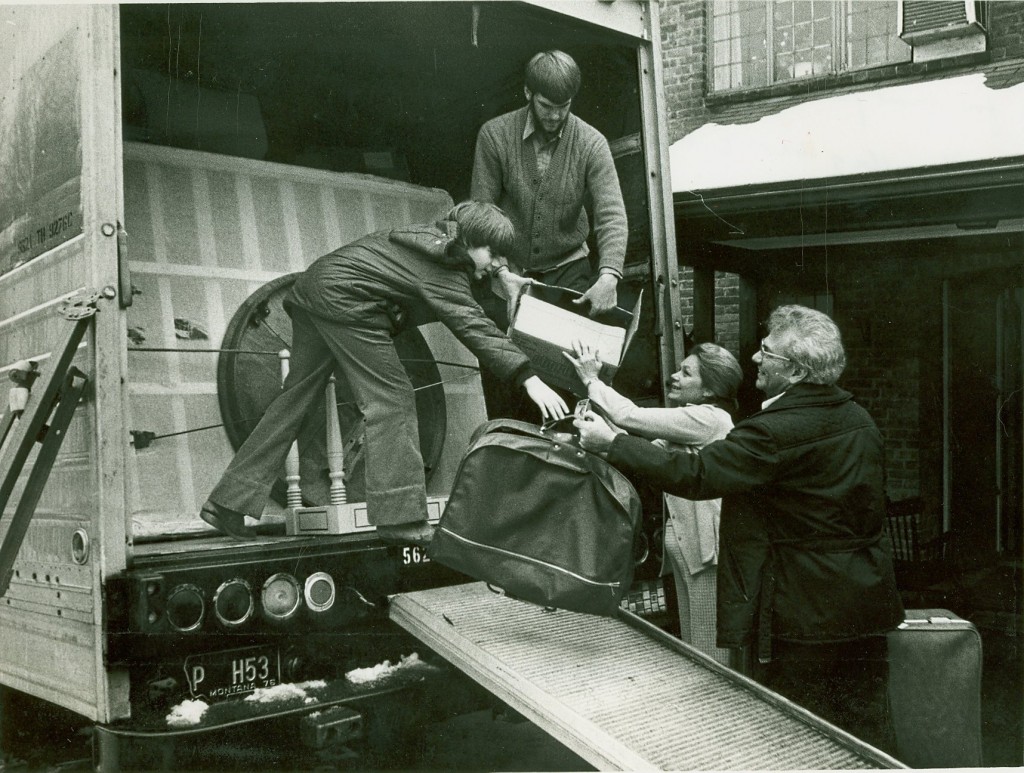 The Boyer family (Ernest L., Kay, Craig, and Stephen) packing a moving truck and preparing for their move from Albany, New York to Washington, D.C., so Ernest L. Boyer can take over as the United States Commissioner of Education. - BCA